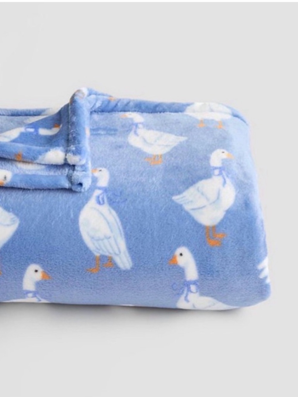 The Big One Blue and White Goose Plush Throw